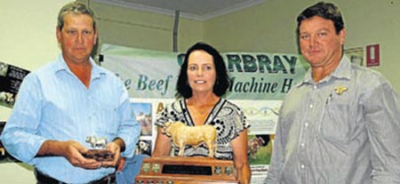 Rob and Denise Newcombe, Newcombe Charbrays, receive the prestigious Tartrus award from Matt Welsh for the promotion of the breed through their exceptional 2010 Show Team.